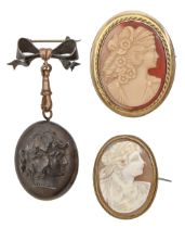 A Victorian jet cameo locket, a silver gilt cameo brooch and one other (3) Cameos undamaged