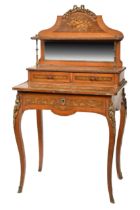 A French brass mounted tulipwood and marquetry writing table, late 19th c, 132cm h; 72 x 48cm