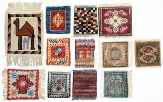 Two Moroccan mats, six Persian Gabbeh rugs and four Pakistan mats, 54 x 48cm and smaller (12)