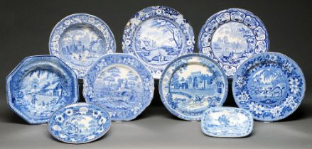 Nine English blue printed earthenware plates and stands, first half 19th c, including Brameld and