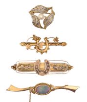 A Victorian 9ct gold bar brooch, 54mm l, Chester 1887 and three other gold or gem set gold brooches,