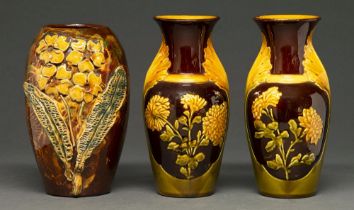 A Longpark art pottery vase, early 20th c, applied with flowers and leaves, 19cm h, incised LONGPARK
