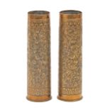 Trench art. A pair of British WWII brass shell cases adapted as spill vases and chased with