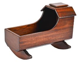 A Victorian fruitwood and mahogany doll's cradle, 38cm l