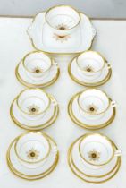 A Royal Crown Derby bone china Star of Eden tea service, comprising six teacups, saucers and side