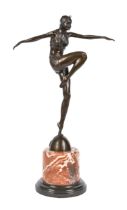 A bronze sculpture of a dancer, late 20th c, in Art Deco style, on marble and slate base, bearing