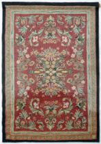 A Kashmir chain stitch rug, mid 20th c, 182 x 123cm, with fixing wall batten