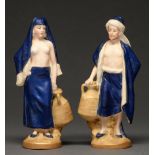 A pair of Royal Dux figures of Eastern water carriers, c1920, 19cm h, mark impressed on pink