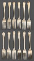 Two sets of six George III silver table forks, Old English pattern, both London, by Eley & Fearn,