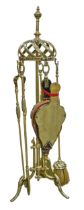 A Victorian ornate brass companion set, 92cm h Good condition