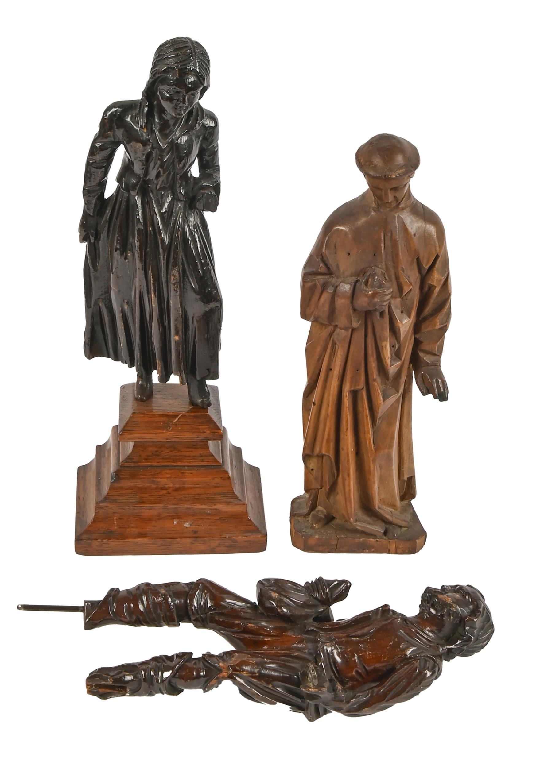 A Continental carved wood figure of a saint, early 20th c, 26cm h and a contemporary pair of stained