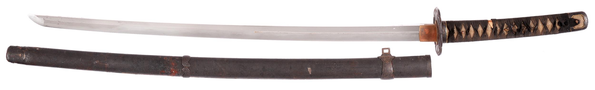 A Katana in Tachi in Koshirae Sugata:  Shinogi-Zukuri Iori-mune with shallow tori-zori Nagasa:. 66.0