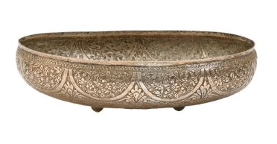 A South East Asian oval silver repousse bowl, early 20th c, on four feet, 31cm l, 8ozs 17dwts