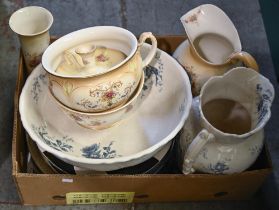 A Victorian earthenware chamber jug and bowl, a Crown Devon chamber jug and similar ware by Crown