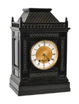 A German architectural ebonised bracket clock, late 19th c, with enamel chapter ring and turned