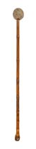 A South East Asian gong mallet, with bamboo handle and stone head, 87cm l