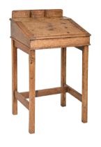 An oak child's desk, mid 20th c, 47cm l Signs of use and ink stains