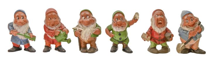Snow White. A part set of six cold painted terracotta figures of the dwarves, 1930s, 15cm h and