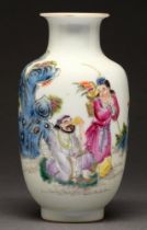 A Chinese famille rose vase, 20th c, painted with two figures between blue rocks, 19cm h, Qiang