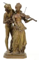 A French bronze troubadour group, "La Lecon de Music", cast from a model by Vincent Desiree Foure de