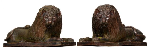 Garden statuary. A pair of Victorian saltglazed brown stoneware lions, Northern England or Scotland,