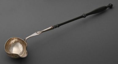 A Continental silver ladle, with engraved bowl and finely turned ebonised wood handle, 42cm l,