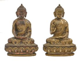 Two South East Asian brass sculptures of Buddha, late 19th / early 20th c, sealed, 17cm h Complete