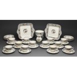 A Wedgwood bone china tea service, early 20th c, with black seaweed border, the service including