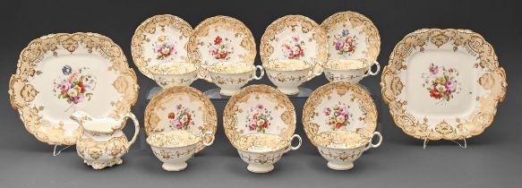 A Coalport tea service, c1835, of Adelaide shape, painted with flowers in fawn and gilt border,