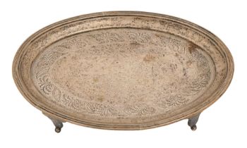 A George III silver teapot stand, the border engraved with trailing foliage, reeded rim, 15.5cm l,