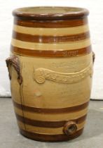 A Victorian Atkins Patent saltglazed brown stoneware water filter, of barrel shape, with shell