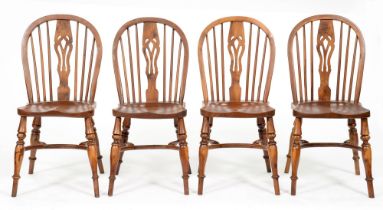 A set of four yew wood Windsor chairs by Tom Thackray, Yorkshire, late 20th/early 21st c, 92cm h,