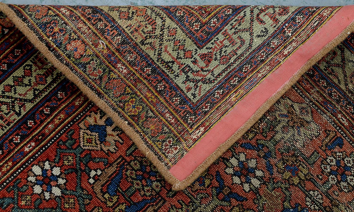 A Persian rug, 228 x 136cm and two runners, 294 x 102cm and smaller - Image 23 of 23