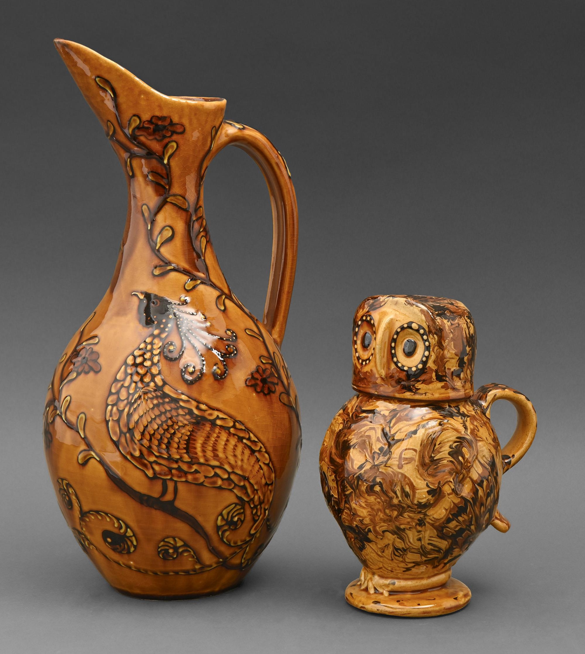 Studio pottery. Carole Glover - Owl jug; Ewer, two, slipware, ewer 38.5cm h, incised signature