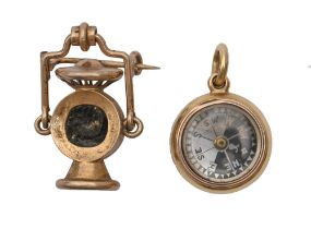 Gold compass charm and miners lamp