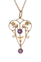 An Edwardian 9ct gold openwork and amethyst pendant, on later gold chain, 4.5g