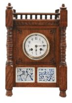 An Aesthetic Movement oak and blue and white tile-inset mantel clock, J W Benson, 25 Old Bond