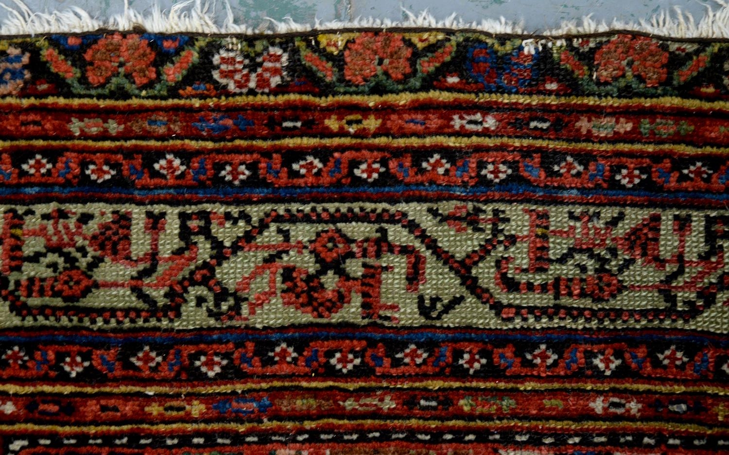 A Persian rug, 228 x 136cm and two runners, 294 x 102cm and smaller - Image 22 of 23