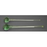 Two Victorian green glass ornamental clubs, 53 and 56cm l Undamaged