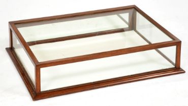 An early 20th c glazed mahogany table top display case, 19cm h; 81 x 60cm
