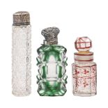 A Victorian green cased and cut glass scent bottle, 75mm h and two other contemporary glass scent