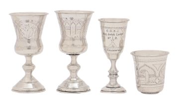 Judaica. A pair of Russian silver kiddush cups, 90mm h, Moscow 1895, one other, Birmingham 1912