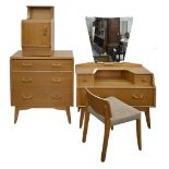 A mid-century G-Plan light oak three-piece bedroom suite, wardrobe 85cm h; 77cm w, a mirror backed