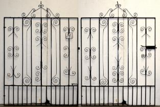 A pair of wrought ito gates, 217cm h, 153cm l (x2)