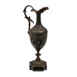 A French ornamental bronze ewer, c1900, on polished slate base, 26.5cm h Undamaged save for slight