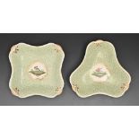 Two Rockingham dessert dishes, c1830-1835, painted with a bird in green blackberry border, 21.5