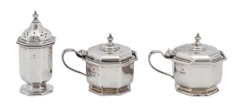 A George V octagonal silver condiment set, blue glass liners, pepperette 80mm h, by Mappin & Webb