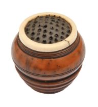 Treen. A turned wood and bone nutmeg grater with steel rasp, early 19th c, 43mm h Originally with