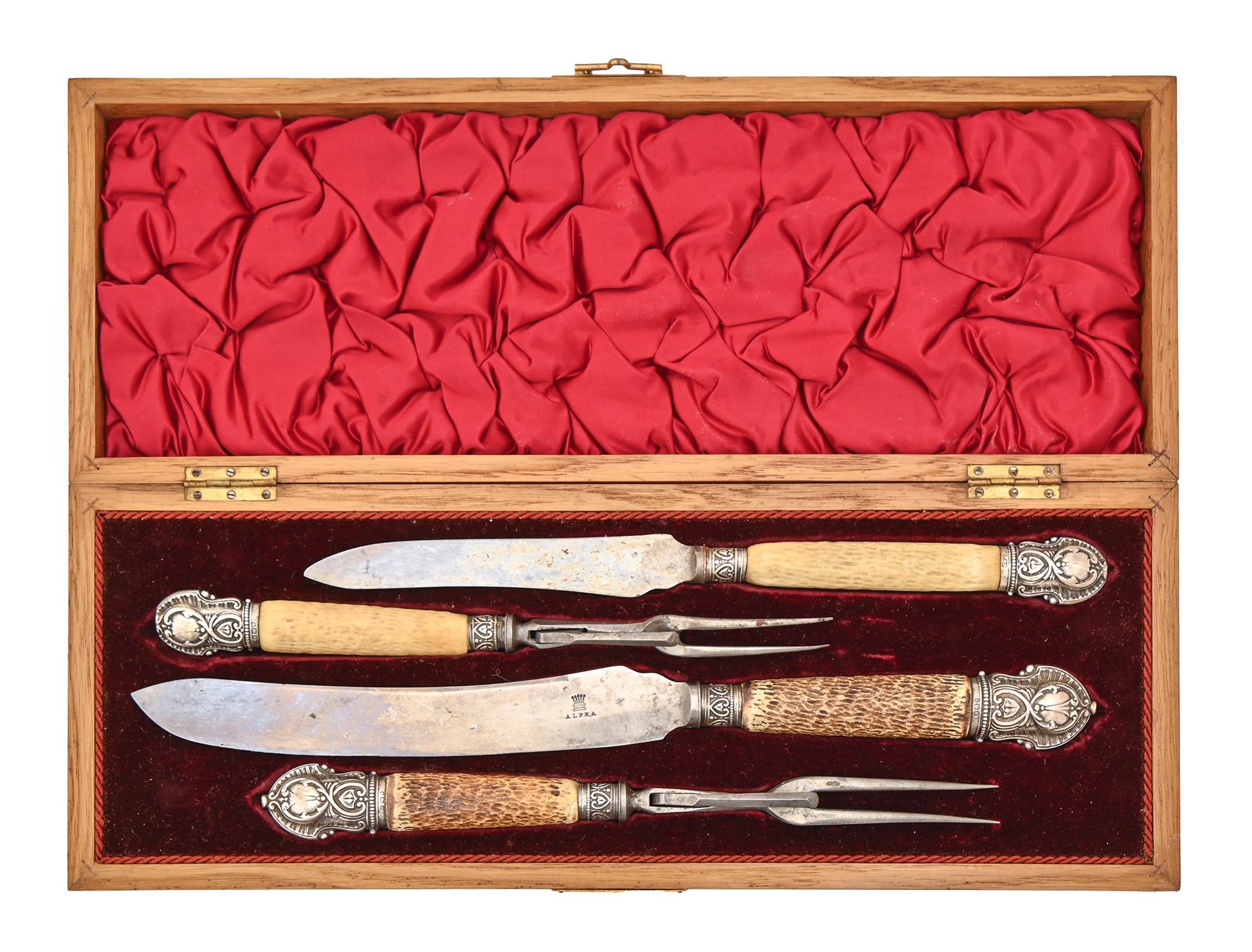 A Victorian silver mounted antler hafted carving set, Sheffield 1895, in plush lined and fitted