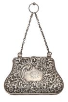 An Edwardian silver bag, die stamped with flowers, scrolls and trellis, chain handle, 12.5cm l, by